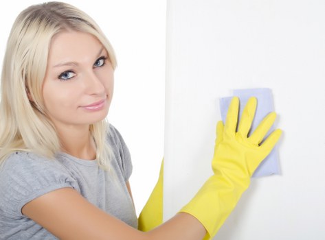 Staff member performing a safety check before carpet cleaning